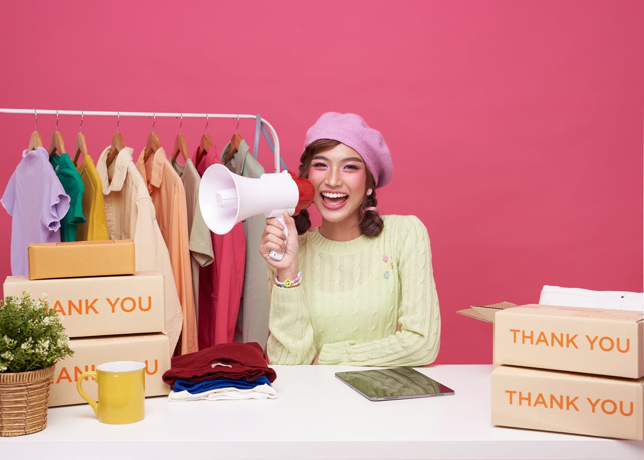 Related image asian young woman shouting into megaphone live streaming sale fashion clothing