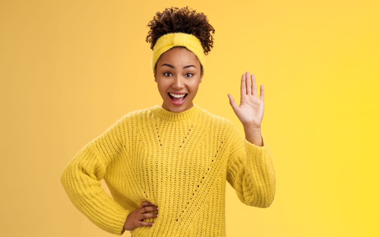 Related image girl raising hand gladly willing participate be candidate say hi hello waving palm greeting gesture